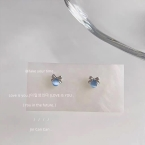 Aros Pasantes Moño Plateado con Piedra Celeste A1462