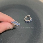 Argollas Huggies Plateadas con Circonitas Celestes A1500
