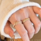 Anillo Regulable Moño con Microperlas y Circonias Dorado J1109