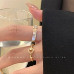 Set de Anillos Dúo Dorado con Inserción Nacarada y Circones J968