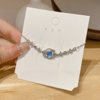 Pulsera Plateada Planeta Saturno con Cristal Azul y Estrellas S238