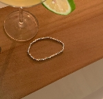 Pulsera Elastizada de Bolitas Plateadas Facetadas S273
