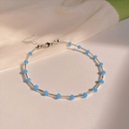 Pulsera Plateada con Canutillos Metálicos y Cuentas de Cristal Celeste S280