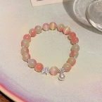 Pulsera de Cuentas Ojo de Gato Durazno con Mariposa en Strass S575