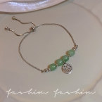 Pulsera Ajustable Plateada con Cuentas Verde Jade y Medalla S626